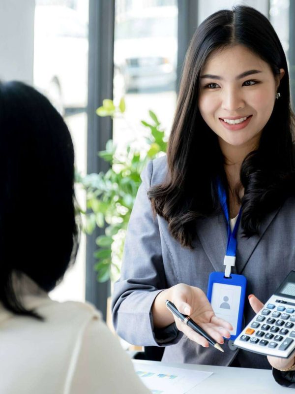salesperson-presents-a-product-service-travel-savings-finance-investment-or-life-insurance.jpg